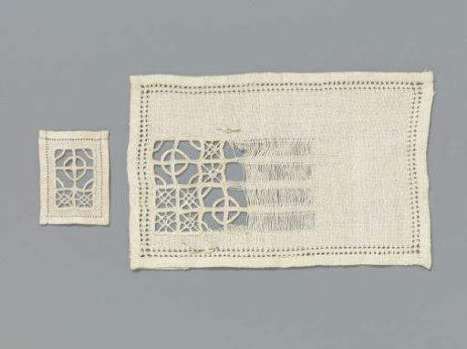 Piece of linen with a beginning of cutwork with wheels and squares as an example of this technique with matching fragment