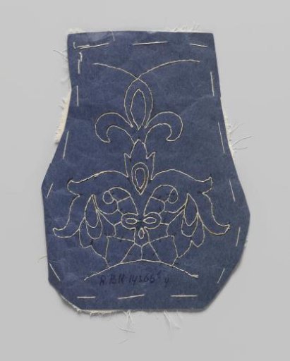 Prickings pinned to a double piece of cotton with tracing threads for making part of a needle lace collar