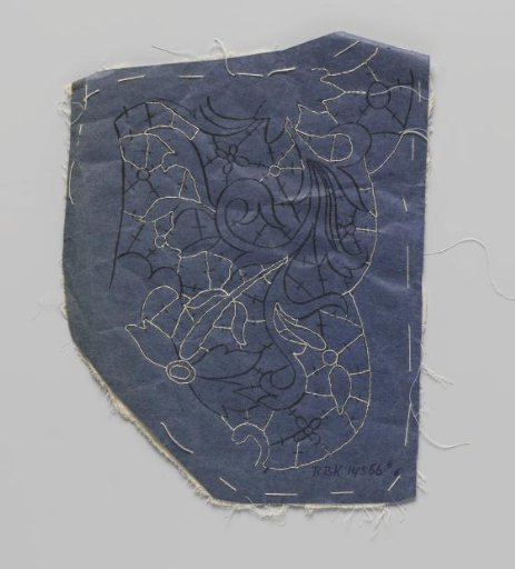 Prickings stitched onto a double piece of cotton with tracing threads for making part of a collar of needle lace