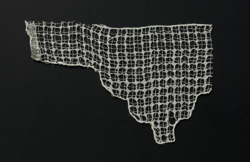 Fragment of Lace Embroidery with Four-Pointed Stars in a Square Network