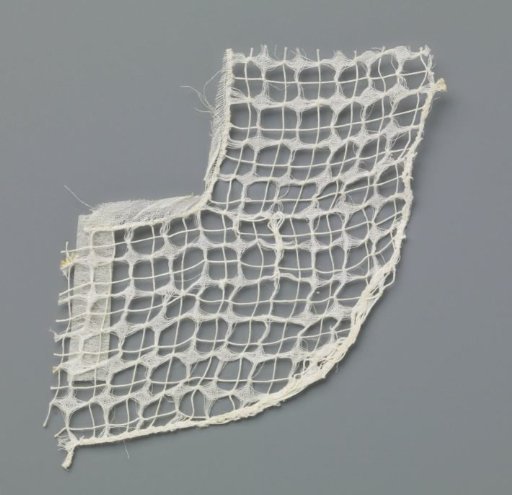 Fragment of lace embroidery with four-pointed stars in a square network