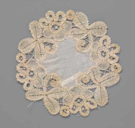 Doily or Carpet of Bobbin Lace with a Three-Leaf Clover and Rosette