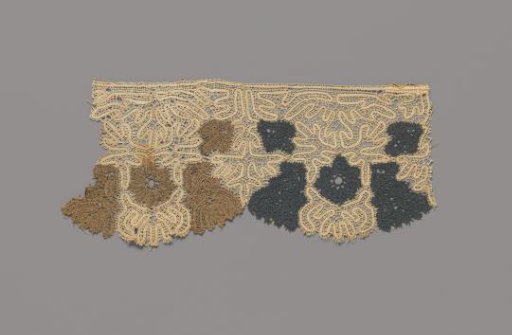 Strip of colored bobbin lace with a twisting ribbon forming a symmetrical pattern