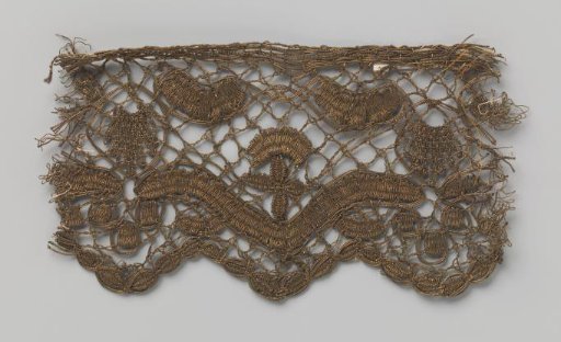 Strip of gold lace with a V-shaped cross