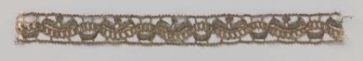 Strip of gold lace with striped wavy band