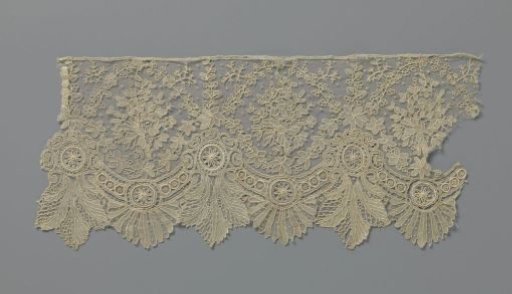Strip of needle lace with medallions and leaves
