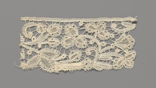 Strip of bobbin lace with oval flowers between three-lobed leaves and a cup flower