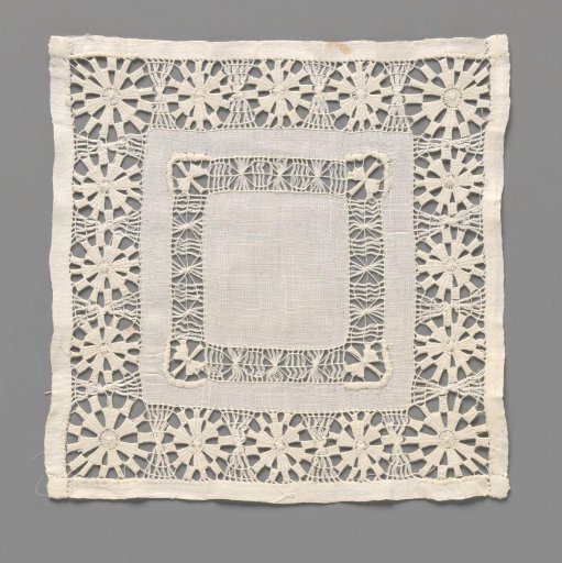 Linen dress with needle lace borders with suns