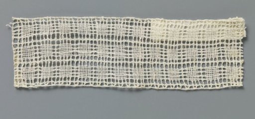 Insert of bobbin lace with three rows of squares
