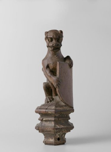 Ape-like Creature Supporting an Escutcheon, from the Top of a Balustrade or the Backrest of the Stadholder’s Chair in the Rolzaal in the Hof van Holland, The Hague