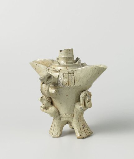 Drinking or pouring vessel