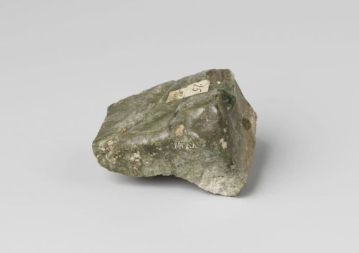 A piece of a brick, partially glazed