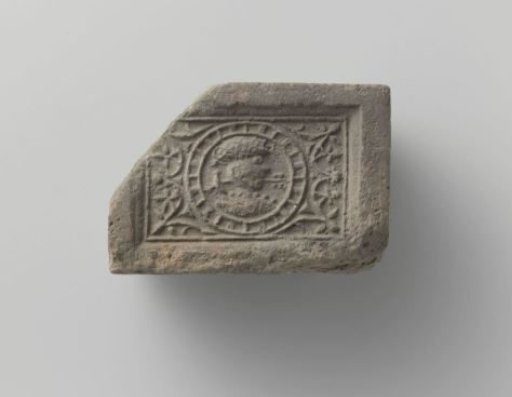 Fireplace with Image of a Man's Head in Profile, Placed in a Round Medallion
