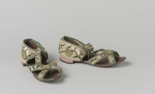 Sandal of white taffeta silk, with chenille embroidery of flowers and vines in flowing colors, edged in plain green