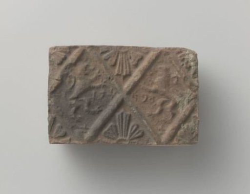 Fireplace stone with two climbing lions facing each other