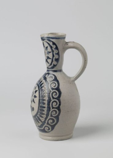 Jug with concentric circles and stylized flowers