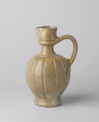 Jug with a mask and incised borders