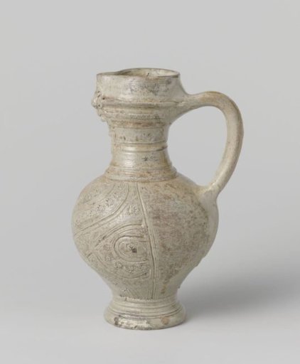 Jug with a lion's head and roundels