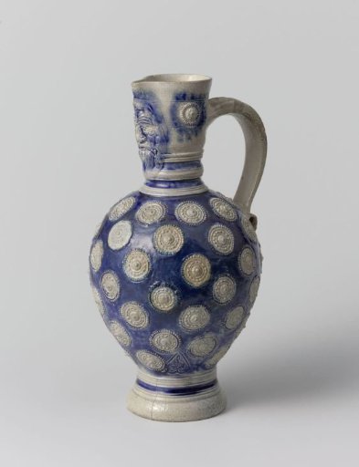 Jug with a mask and medallions