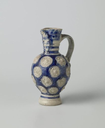 Jug with a lion’s head and medallions