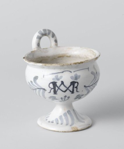 Holy water font of faience