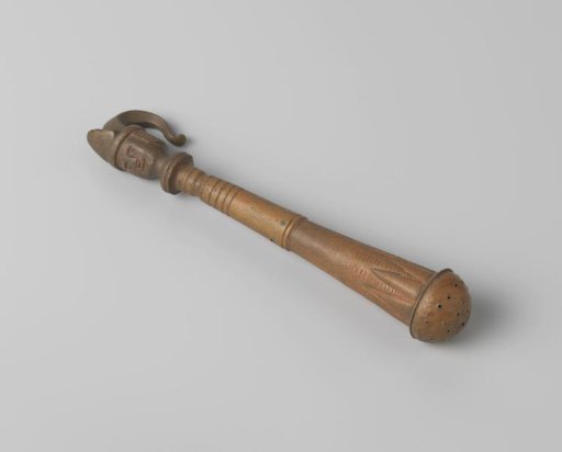Sprinkler or sprinkling bottle with a jester's head