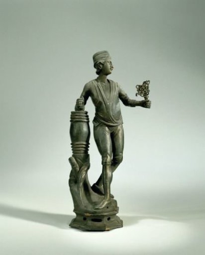 Figure of a Man Next to a Barrel
