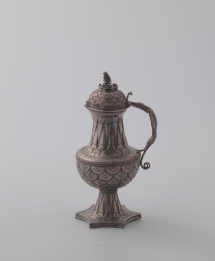 Ampulla of silver on a hexagonal foot