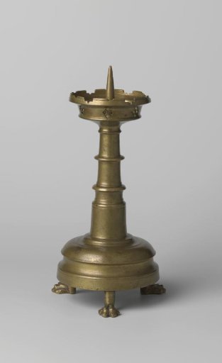 Candelabrum with profiled foot and stem, resting on three claw feet
