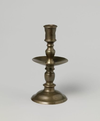 Collar or disc candlestick of brass
