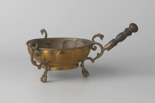 Brass and wood stove