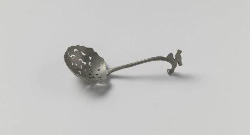 Tin sugar spoon with a bird