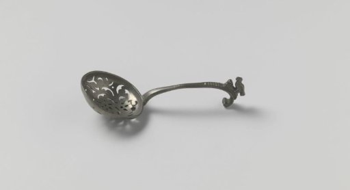 Tin sugar spoon with a bird