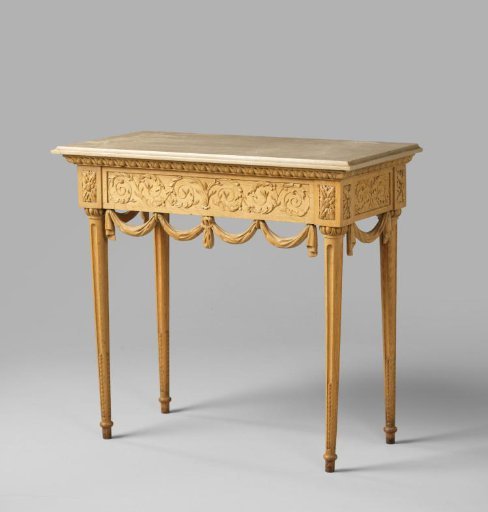 Side table with fluted legs and acanthus and drapery decoration on the front and side rails