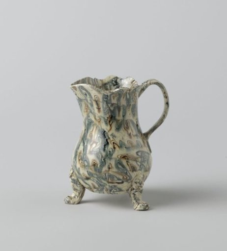 Milk jug of hard-fired earthenware; Whieldon ware, agate ware ("lapwing")