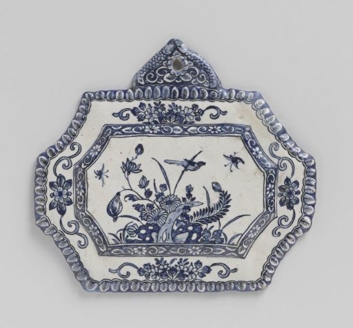 Plate of blue-painted faience