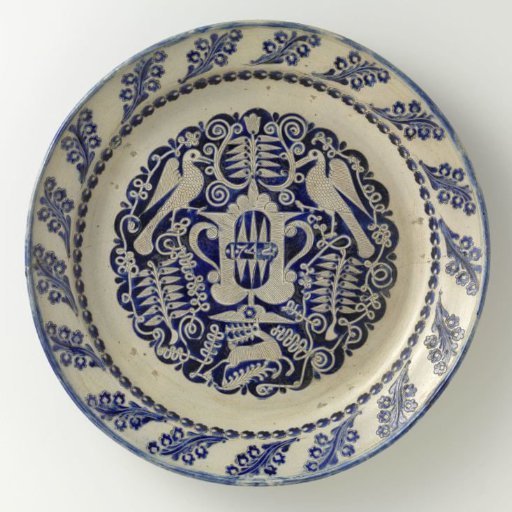 Dish with a vase, birds and a deer