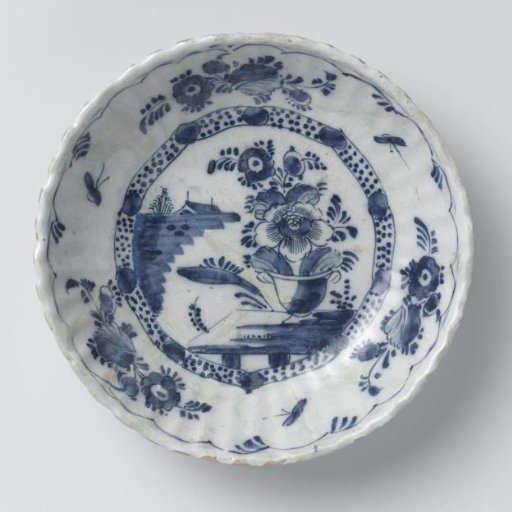 Dish, ribbed, painted on the base with a flowerpot on a table
