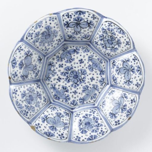 Dish with a nine-lobed rim of blue-painted faience