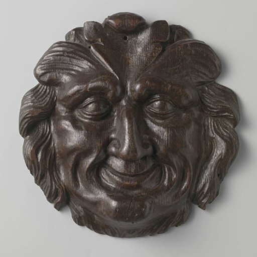 Man's Head in Wood