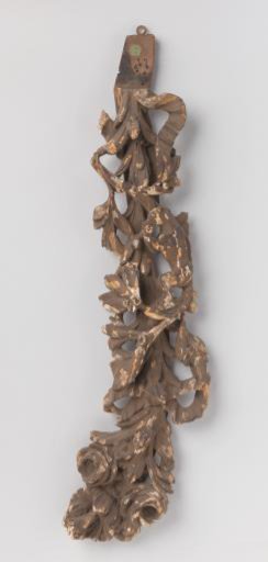 Architectural fragment of wood with festoons