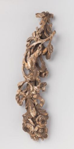 Architectural fragment of wood with festoons