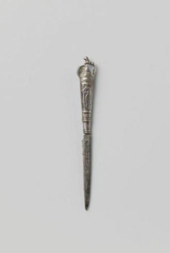 Knife with a handle depicting abundance and constancy