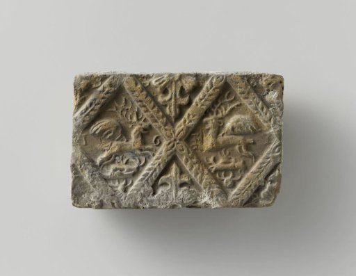 Fireplace surround depicting two winged stags, set in two panels