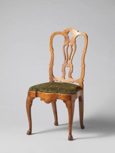 Chair with upholstery of pressed velvet featuring a pattern of a laurel-crowned male head in profile on the back
