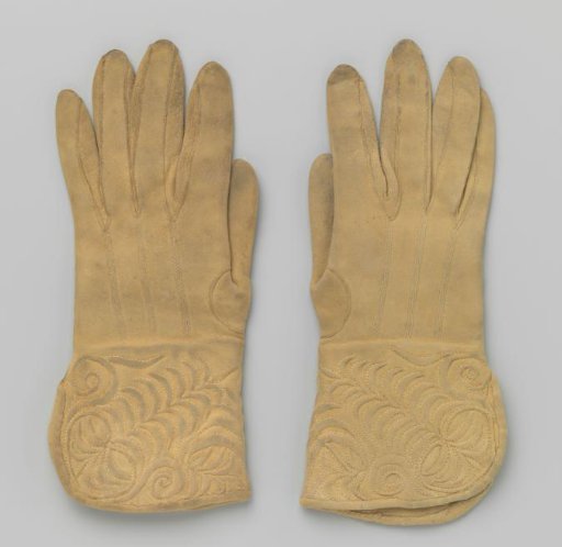 Glove of deerskin (?) with wide, knitted cuffs decorated with a symmetrically quilted relief motif, men's model