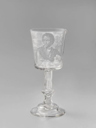 Covered beaker with a man with a jug