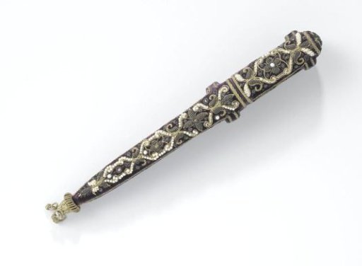 Long, tapering case with lid, of leather divided into three compartments, lined with purple velvet and embroidered with gold and silver thread, freshwater pearls, and silver ornaments