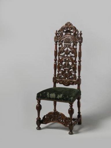 Chair with upholstered seat and carved openwork back. Decoration of broken scrolls, shell motifs and acanthus leaves