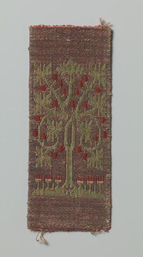 Fragment of a Cologne tapestry weave with a pattern of a stylized tree with bell-shaped flowers. The tree stands on a flowering field.